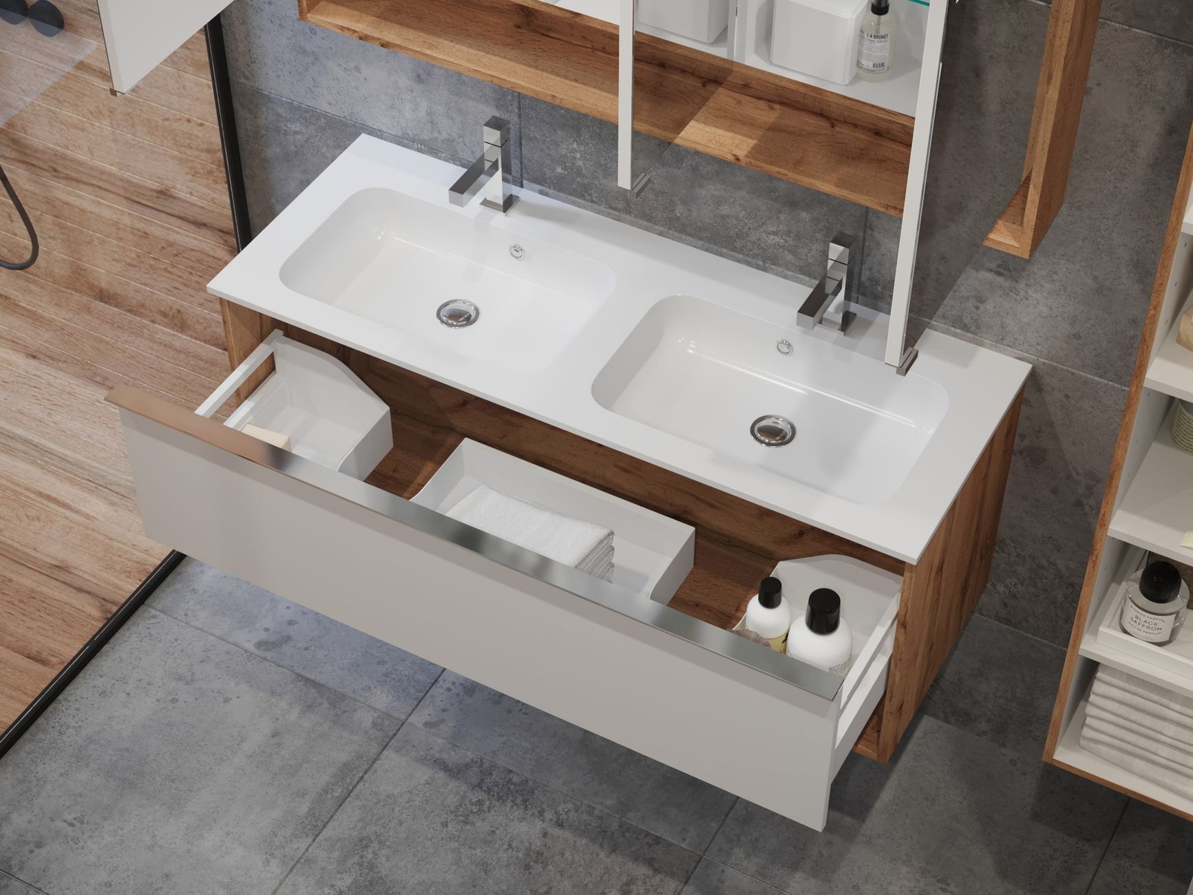 Double-sink bathroom vanity with an open pull-out drawer containing white storage compartments and bottles.